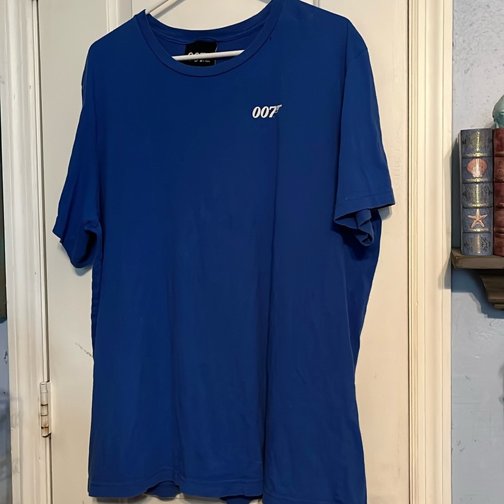 007 Store size XLARGE blue t-shirt. Gently worn